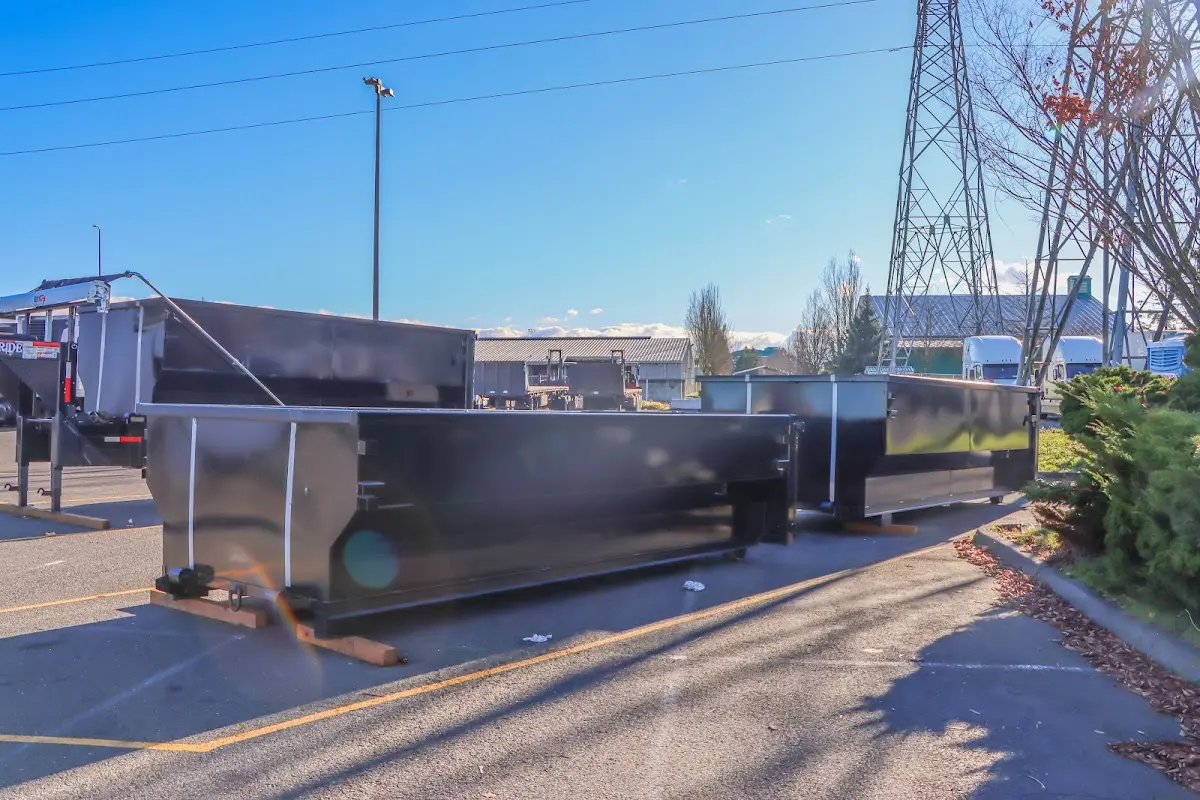 Roll-off dumpster ready for waste disposal at job site for Commercial Dumpster Rental in Raceland